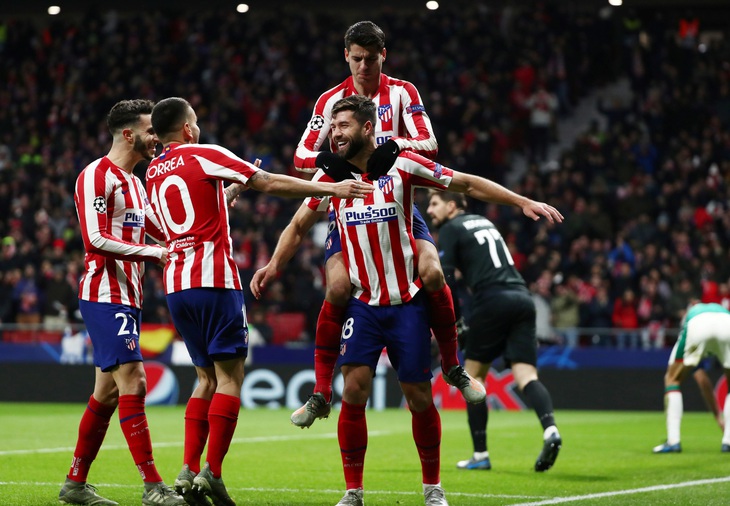Atletico Madrid đáp ‘tàu muộn’ vào vòng 16 đội Champions League - Ảnh 2.
