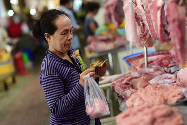 Đề xuất giữ giá bình ổn thịt heo cận tết thấp hơn 10% so với giá thị trường - Ảnh 1.
