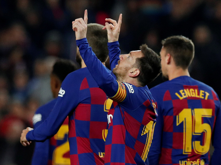 Messi lập hat-trick, Barca tiếp tục giữ đỉnh bảng bất chấp nỗ lực của Real - Ảnh 2.