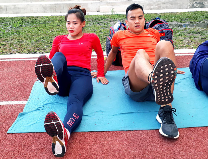 Con được 6 tháng, mẹ bỉm sữa tập luyện giảm 32kg để thi đấu SEA Games - Ảnh 1.