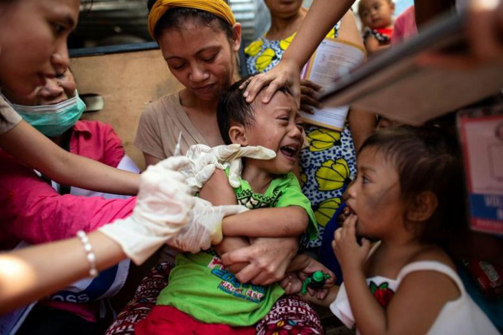 Gần 15.000 người đã nhiễm sởi ở Philippines và vẫn đang tăng - Ảnh 1.
