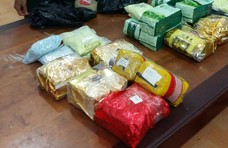 Bắt 2 người nghi mang 26,6kg ma túy từ Campuchia về Việt Nam - Ảnh 1.