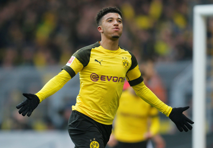 Sancho lập cú đúp giúp Dortmund soán ngôi của Bayern Munich - Ảnh 1.