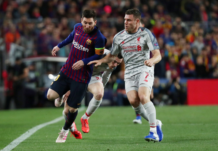 CĐV Liverpool nhức mắt với nụ cười bí hiểm của Messi - Ảnh 2.