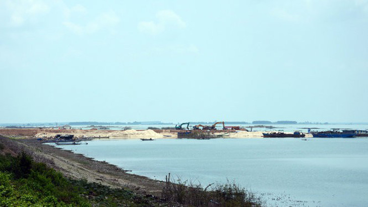 Báo cáo Thủ tướng việc khai thác cát trong lòng hồ Dầu Tiếng - Ảnh 1.