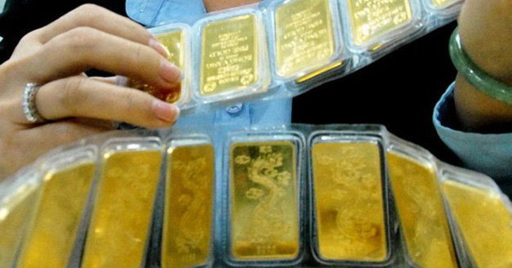 Giá vàng giảm về sát 41 triệu đồng/lượng - Ảnh 1.