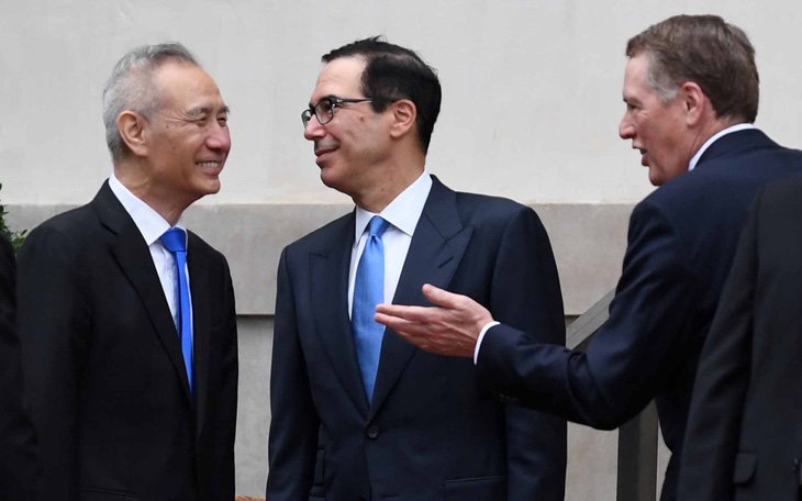 Mỹ - Trung đổi nơi đàm phán, mong cơ hội mới - Ảnh 1.