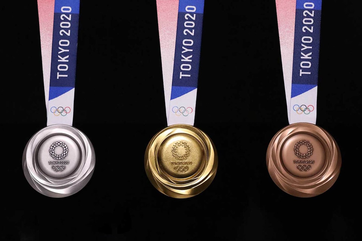 Tokyo công bố mẫu huy chương Olympic 2020 làm từ rác điện tử - Ảnh 1.