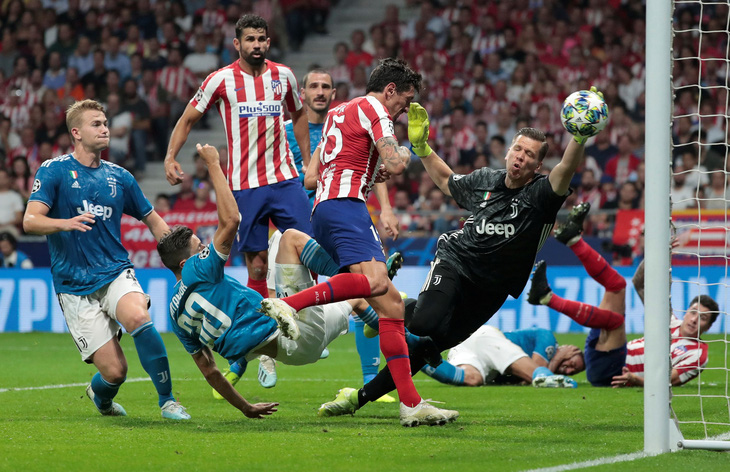 Ronaldo mờ nhạt, Juventus đánh rơi chiến thắng dù dẫn trước Atletico 2-0 - Ảnh 3.