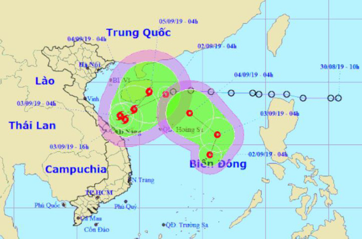 Hai áp thấp nhiệt đới đang cùng hoành hành trên Biển Đông - Ảnh 1.