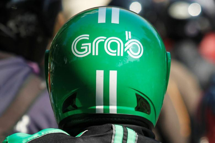 Malaysia điều tra hành vi độc quyền của Grab - Ảnh 1.