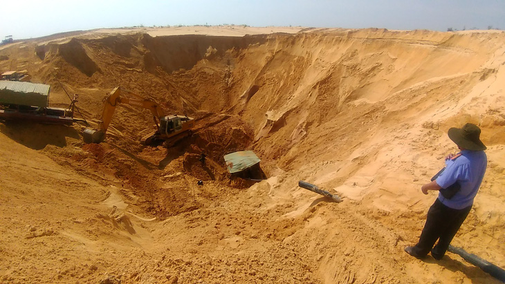 Sập mỏ khai thác quặng titan, một công nhân bị chôn vùi - Ảnh 3.