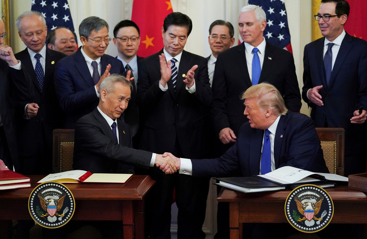 Ký thỏa thuận thương mại với Mỹ, Bắc Kinh hứa thực thi nghiêm túc - Ảnh 3.