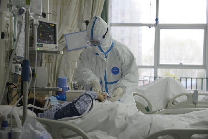 Trung Quốc xây bệnh viện 1.000 giường trong cuối tuần để đối phó virus corona - Ảnh 1.