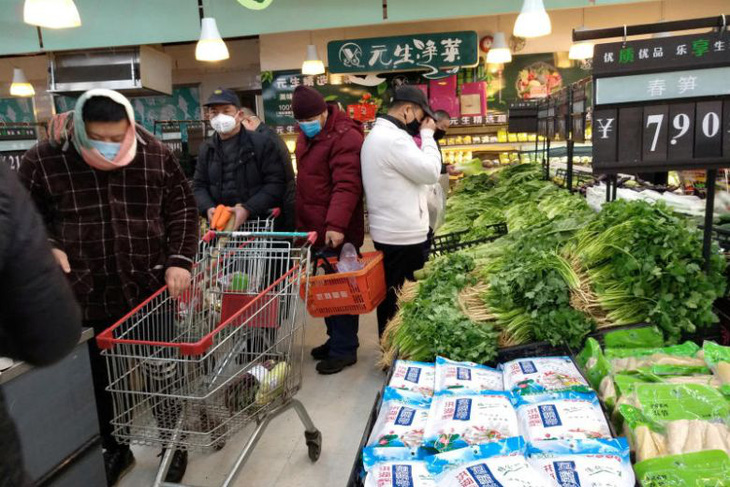 Bắc Kinh buộc các nơi cấp lương thực cho Vũ Hán đang bị phong tỏa - Ảnh 2.