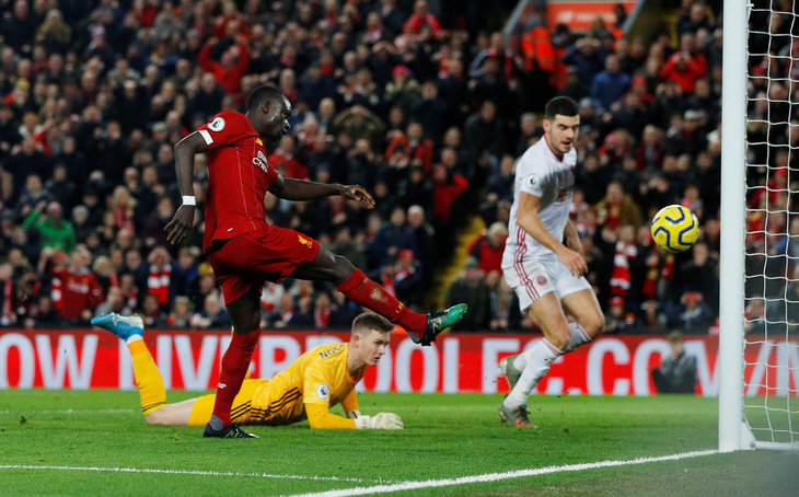 Thắng nhẹ nhàng Sheffield, Liverpool vững chắc ngôi đầu Premier League - Ảnh 2.