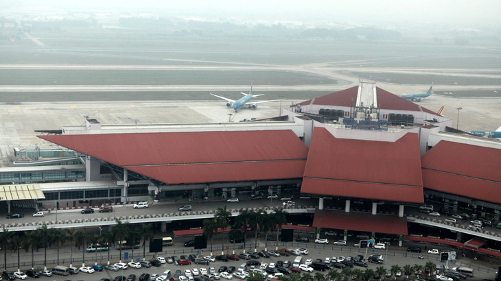 Cách ly 2 hành khách Trung Quốc sốt cao khi bay từ Chu Lai đến Hà Nội - Ảnh 1.