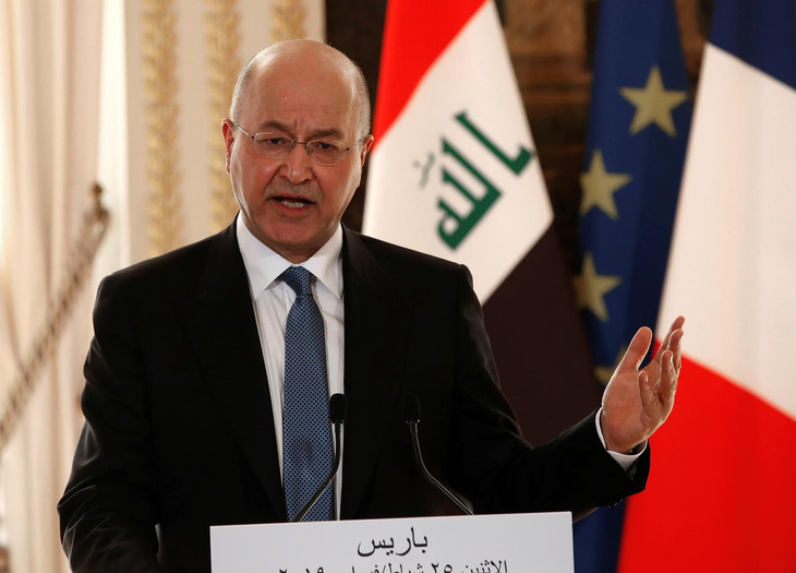Tổng thống Iraq lên án hành động đáp trả Mỹ của Iran - Ảnh 1.