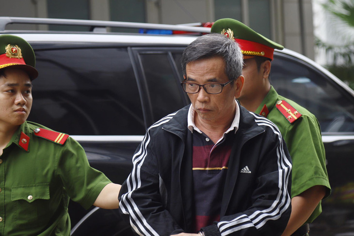 Cựu phó tổng giám đốc BIDV Trần Lục Lang lãnh 8 năm tù - Ảnh 2.