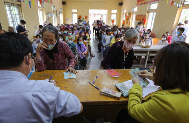 115 hộ dân ở Hà Nội phải trả lại 280 triệu tiền hỗ trợ COVID-19 vì không nghèo - Ảnh 1.