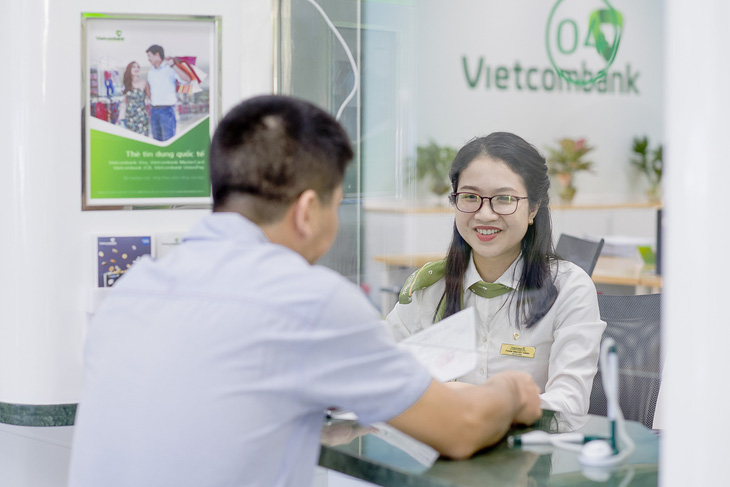 Vietcombank tiếp tục giảm lãi vay hỗ trợ doanh nghiệp - Ảnh 1.