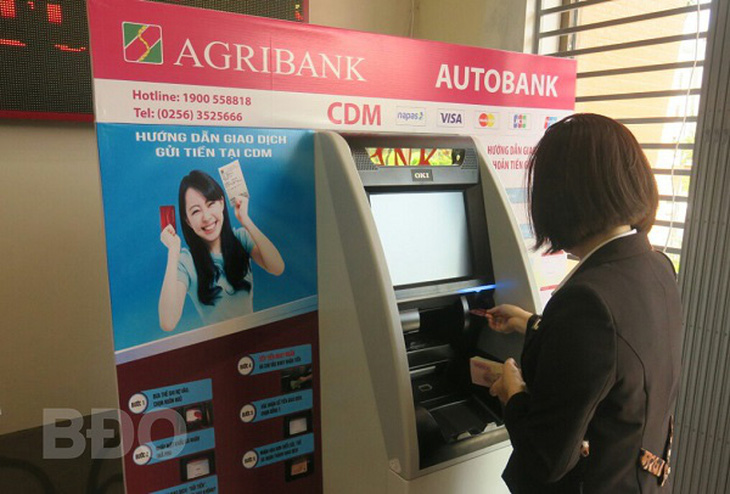 Agribank đã phát hành gần 300.000 thẻ ở nông thôn - Ảnh 1.