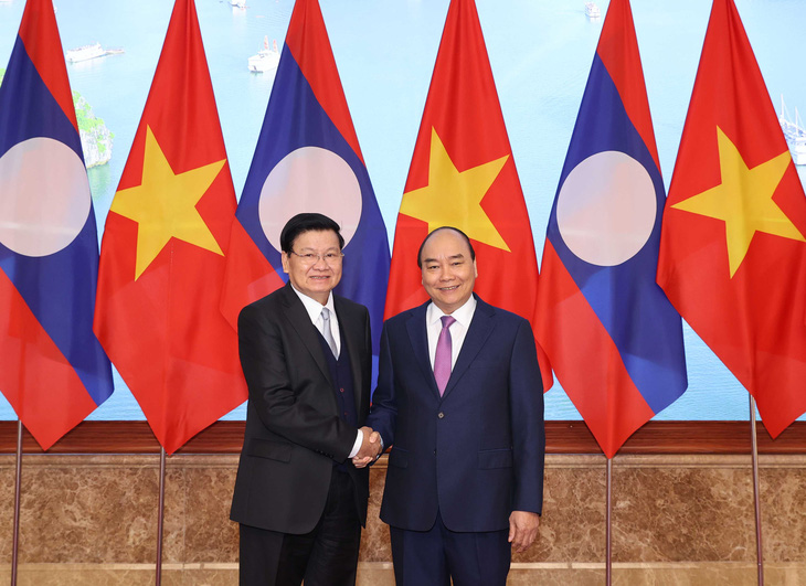 Việt Nam, Lào khẳng định phối hợp, ủng hộ nhau trên các diễn đàn quốc tế - Ảnh 1.