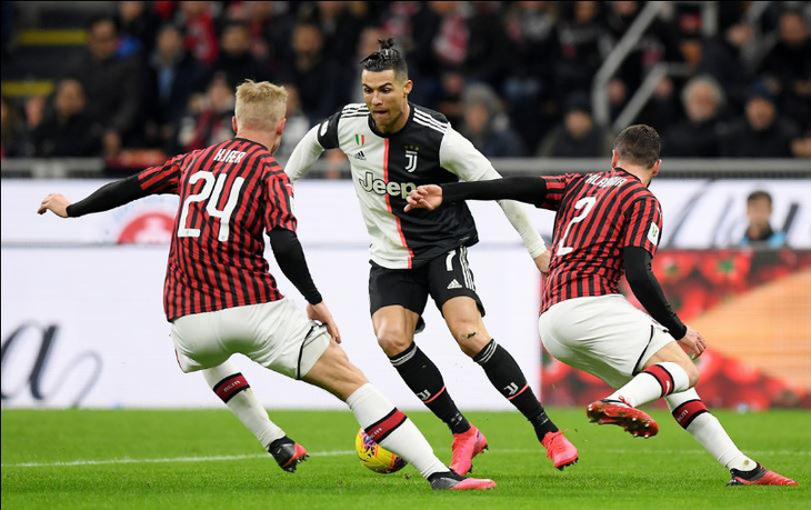 Ronaldo ghi bàn phút 90+1 giúp Juventus cầm hòa AC Milan - Ảnh 1.
