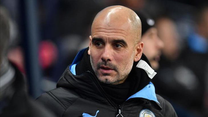 Guardiola vẫn gắn bó dù Man City bị cấm dự Champions League - Ảnh 1.