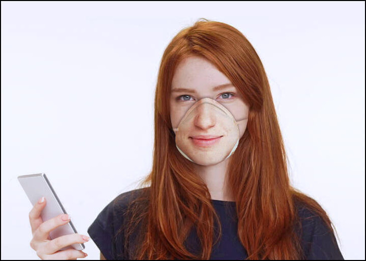Trò đùa công nghệ: khẩu trang 900.000 đồng in hình khuôn mặt để mở điện thoại - Ảnh 1.