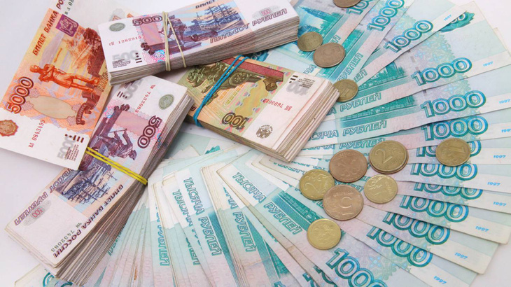 Đồng ruble của Nga giảm xuống mức thấp nhất trong bốn năm - Ảnh 1.
