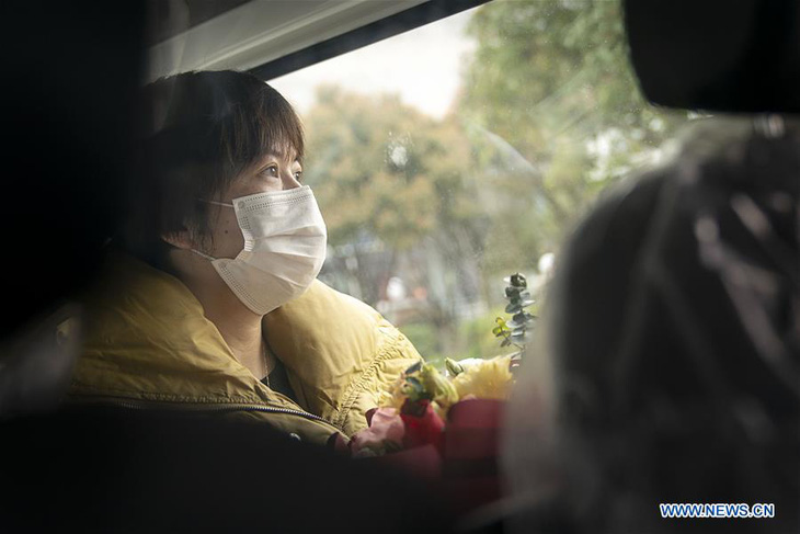 Nhiều tỉnh ở Trung Quốc khôi phục giao thông, cuộc sống dần bình thường - Ảnh 2.