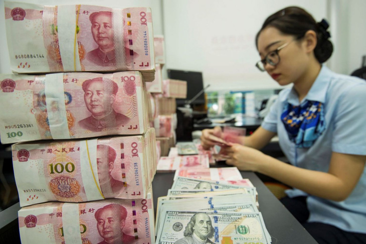 Trung Quốc cắt giảm tỉ lệ dự trữ bắt buộc của các ngân hàng - Ảnh 1.