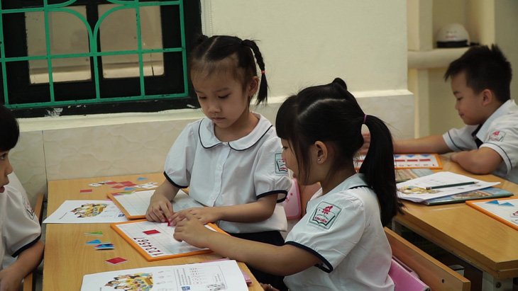 Nhà xuất bản Giáo dục Việt Nam công bố giá sách giáo khoa mới - Ảnh 1.