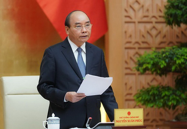 Thủ tướng Nguyễn Xuân Phúc: Cần nới lỏng một bước, nhưng vẫn phải kiểm soát đúng mức - Ảnh 1.