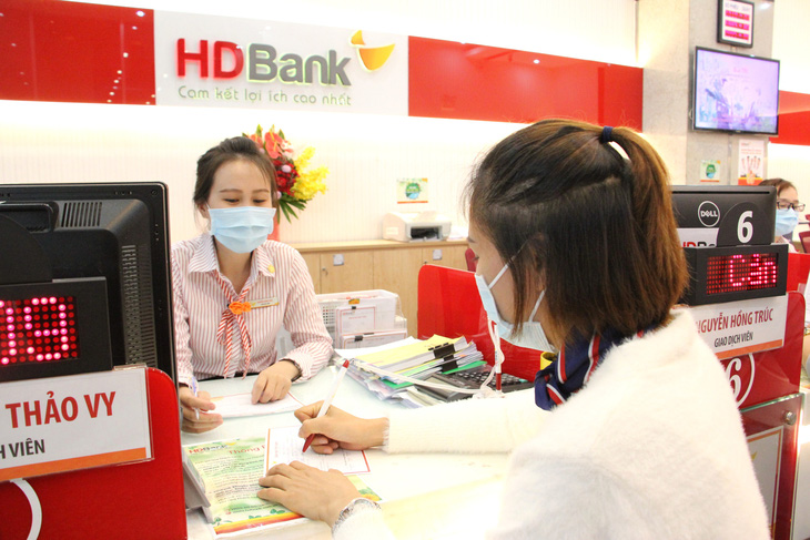 HDBank cộng lãi suất, miễn phí chuyển khoản nội mạng cho khách hàng Saigon Co.op - Ảnh 1.