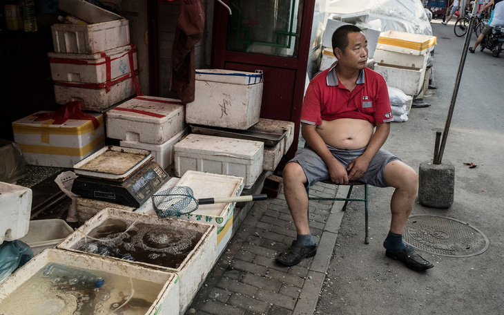 Bắc Kinh phạt thẳng tay người khạc nhổ, phóng uế, thả chó chạy rông