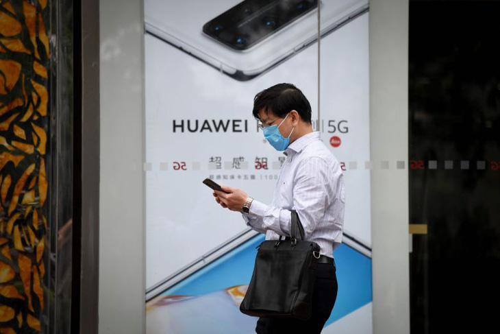 Trung Quốc đòi Mỹ ngừng đàn áp vô lý Tập đoàn Huawei - Ảnh 1.