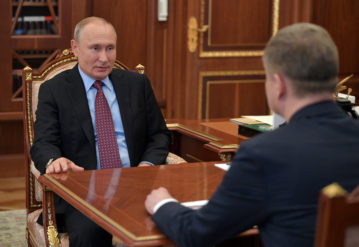 Ông Putin trở lại điện Kremlin sau thời gian dài làm từ xa  - Ảnh 1.