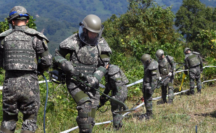 Hàn Quốc, Triều Tiên nổ súng qua lại gần chốt an ninh trong khu DMZ - Ảnh 1.