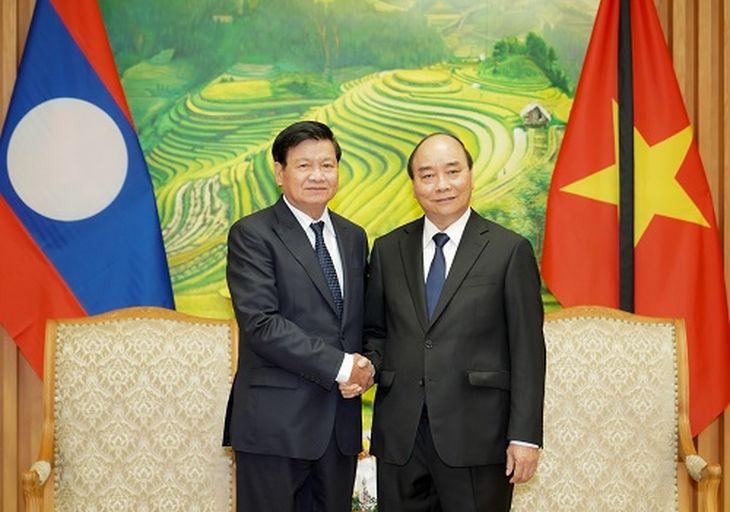 Thủ tướng Lào dự lễ tang nguyên Tổng bí thư Lê Khả Phiêu - Ảnh 1.