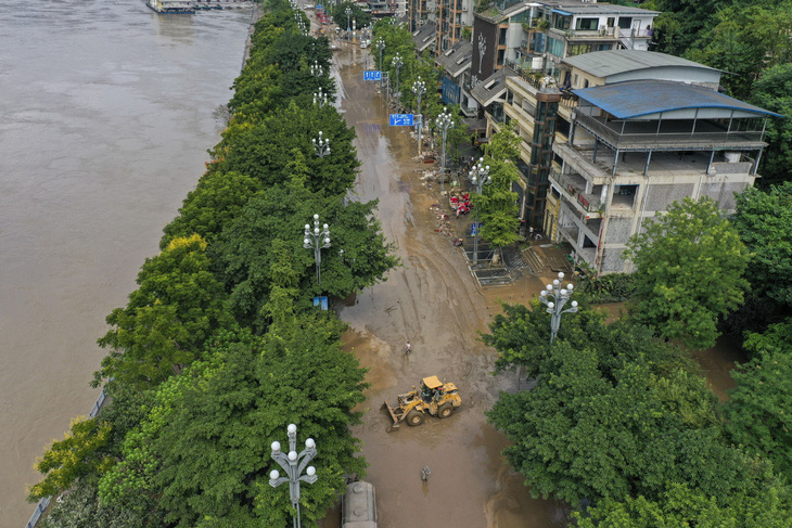 Chùm ảnh hậu lũ lụt lịch sử ở Trùng Khánh - Ảnh 9.