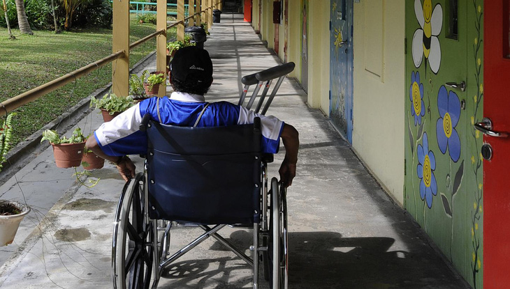 Từ 1/10 Singapore thực hiện chương trình bảo hiểm cho người tàn tật - Ảnh 1.