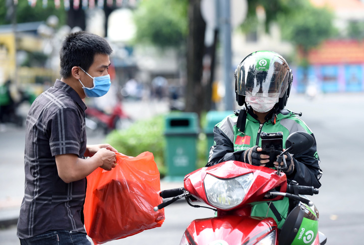 Gojek nhận lượng đơn hàng khủng ngay trong ngày đầu ra mắt - Ảnh 1.