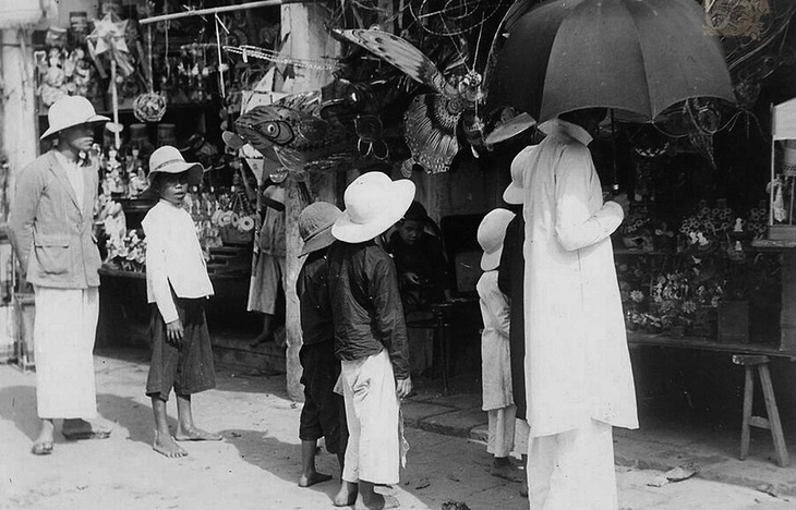 Chiếc nón lá dãi nắng dầm mưa cùng người Việt - Ảnh 4.