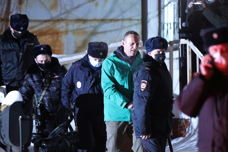 Chính trị gia đối lập Navalny kêu gọi biểu tình sau khi Nga bắt giam - Ảnh 1.