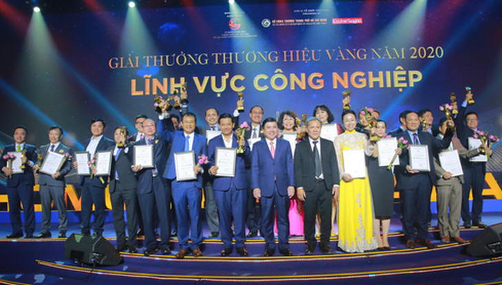 30 doanh nghiệp ở TP.HCM nhận danh hiệu Thương hiệu Vàng - Ảnh 1.