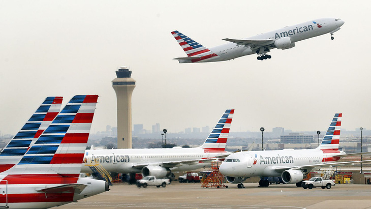 Giá vé máy bay ở Mỹ rớt xuống thấp nhất trong vòng 2 thập kỷ - Ảnh 1.
