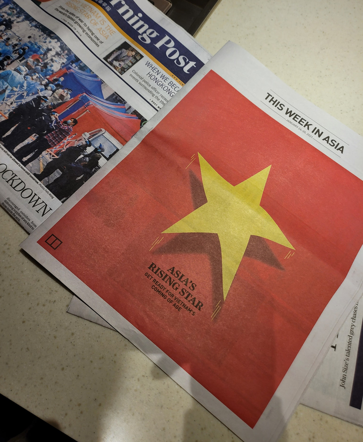 Báo Hong Kong in nguyên trang quốc kỳ Việt Nam, dành 6 trang viết về Đại hội Đảng XIII - Ảnh 1.