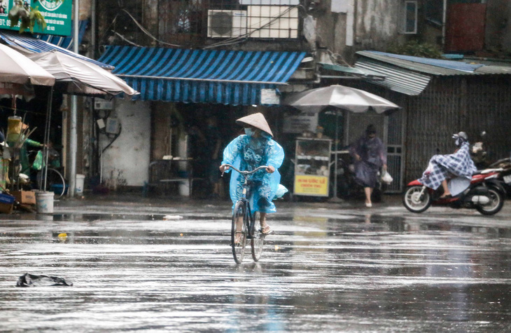 Gió mùa đông bắc tràn về, Hà Nội chuyển lạnh 20 độ C - Ảnh 2.